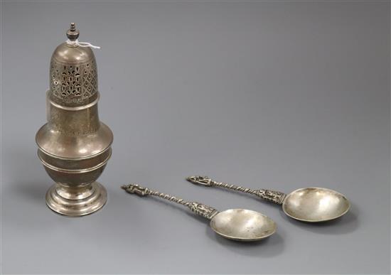 An Edwardian Asprey & Co silver sugar caster, London 1908 and two continental white metal spoons.
